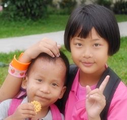 The blind students will be performing for the picnickers.